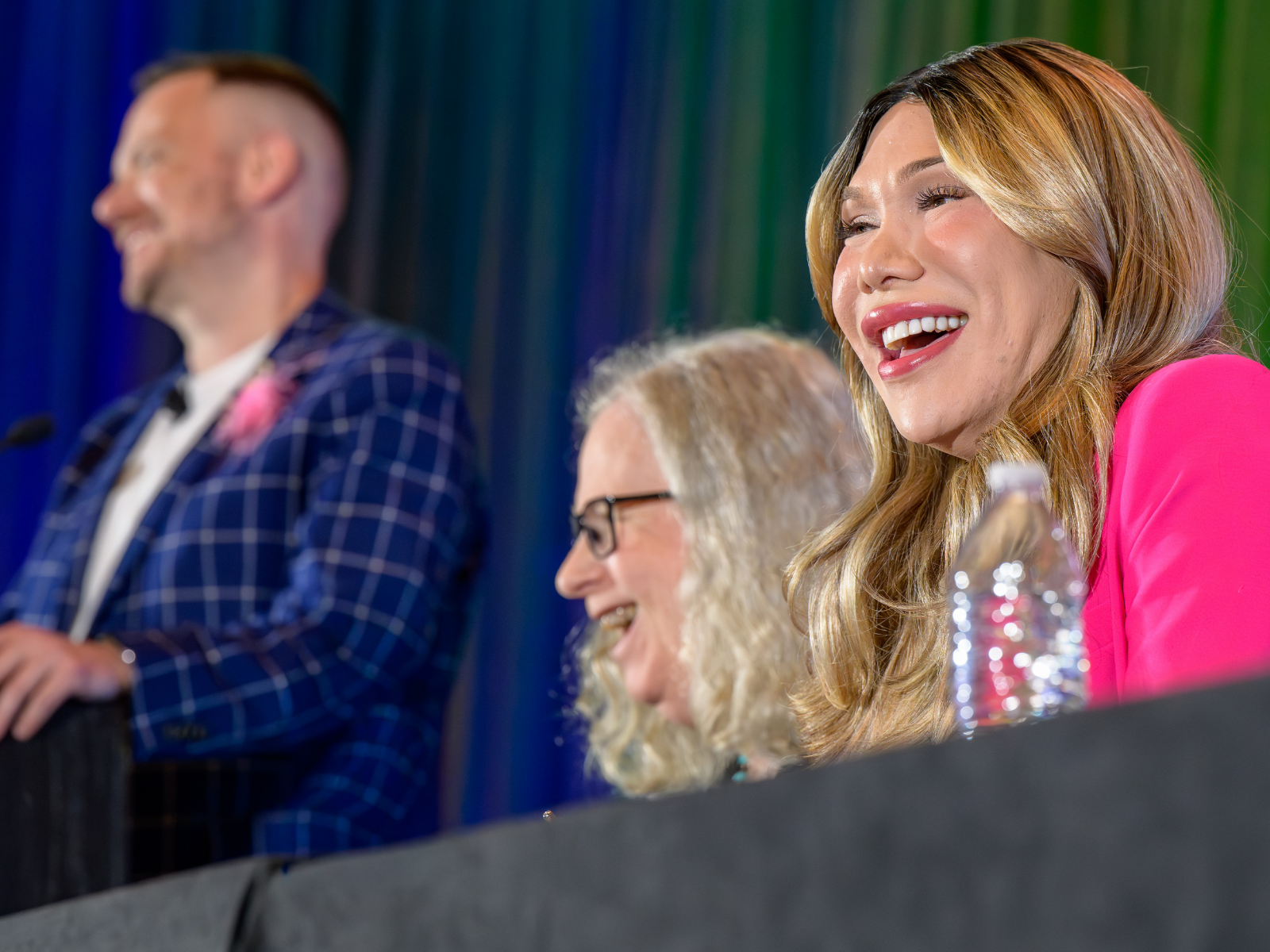 Sponsor booths and attendee interactions at the GLMA Annual Conference